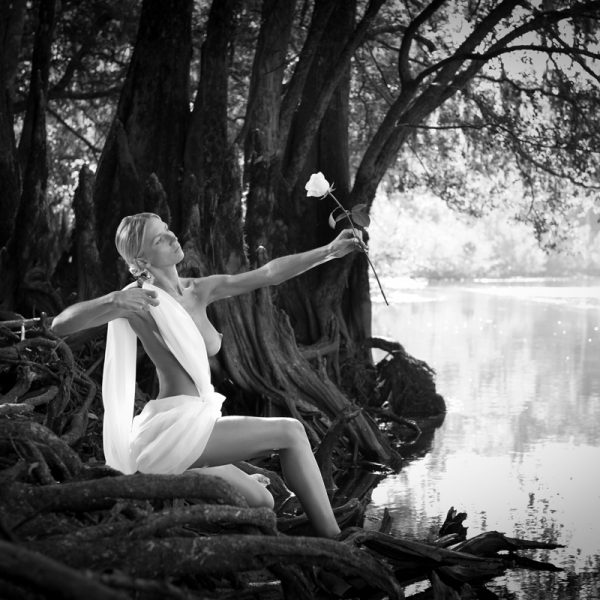 Black and white Art photo of goddess Artemis shooting her bow